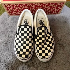classic black and white slip-on checkered vans